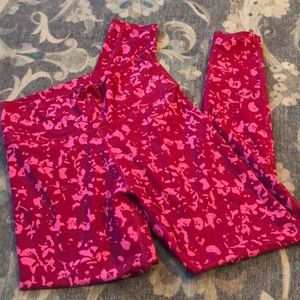 Fabletics high rise berry colored leggings.